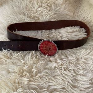 Leather belt with textile framed buckle